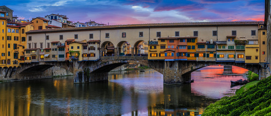 Beautiful sunset view of bridge Ponte Vecchio, Florence, Italy