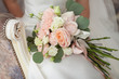 © monoliza - bridal bouquet in the hands of