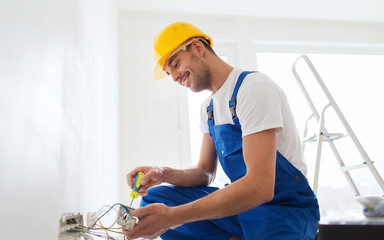 Canvas Print - builder with tablet pc and equipment indoors