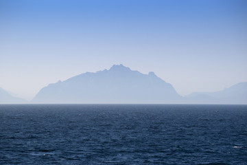 Wall Mural - Silhouettes of Lofoten islands in the fog, Norway