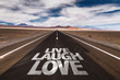 © gustavofrazao - Live Laugh Love written on desert road