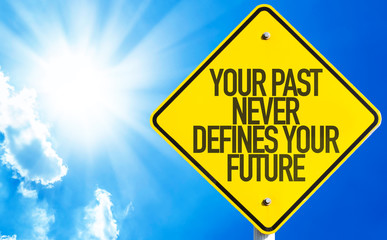 Your Past Never Defines Your Future sign with sky background