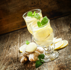 Canvas Print - Hot ginger tea with lemon and mint, selective focus