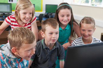 Wall Mural - Group Of Elementary Pupils In Computer Class