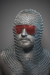 Wall Mural - man in chain mail and leather painted silver, medieval warrior