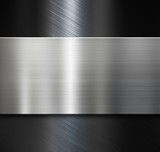 metal plate over black brushed metallic background
