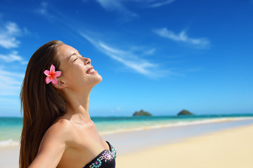 Wall Mural - Relaxing serene woman on Hawaii Lanikai beach