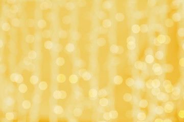 Wall Mural - blurred golden background with bokeh lights