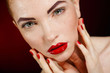 © GTeam - Studio portrait of a redhead female model.