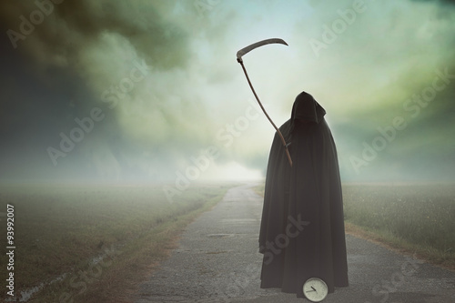 Valokuva  Death with scythe in a surreal landscape