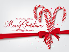 Merry Christmas Greetings In Realistic 3D Candy Cane And Christmas Balls In Background. Vector Illustration
