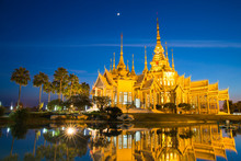 The Beautiful Golden Buddhist Temple In Night Time At Nakhon Ratchasima Thailand