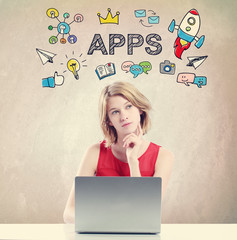  APPS concept with woman working on a laptop