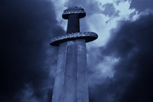 Medieval Viking Sword Against A Dramatic Sky