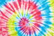 close up shot of spiral tie dye fabric texture background