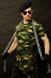 © petrdlouhy - Young soldier in sunglasses poses with a chain around his neck