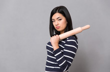 Asian Girl Holding Rolling Pin