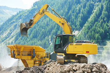 excavator and stone crusher machine