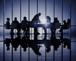 © Rawpixel.com - Silhouettes of business people in a conference room Concept