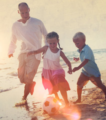 Canvas Print - Family Playing Socce Summer Beach Parenting Concept