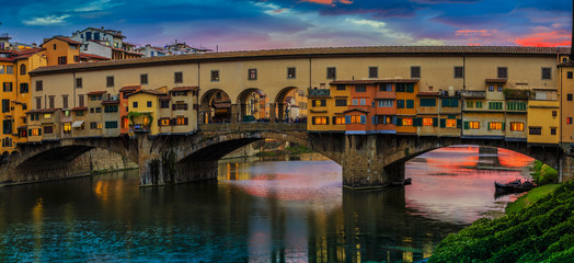 Beautiful sunset view of bridge Ponte Vecchio, Florence, Italy