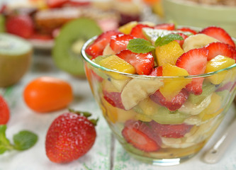 Wall Mural - Fruit salad with mango and strawberries