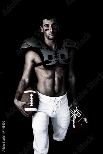 Shirtless Rugby Player Holding Ball And Helmet Buy This Stock