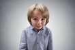 © Brian Jackson - Cute cheeky boy with guilty expression