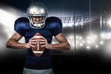 Poster - Composite image of angry american football player holding ball