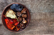 Mix roasted vegetables on a plate top view