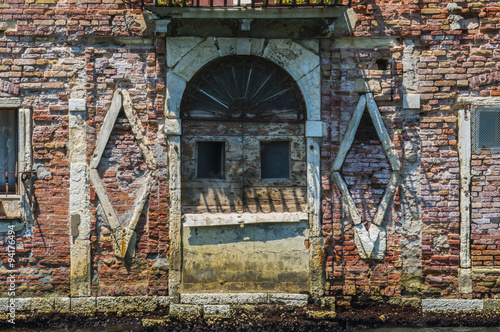 Photographie Old disused warehouse in Venice Italy decorated like a Cyberman Robot