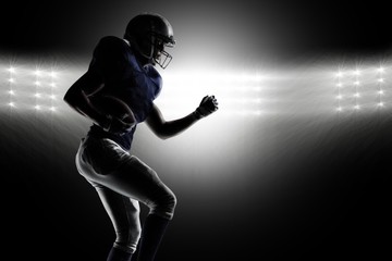 Canvas Print - Composite image of american football player running