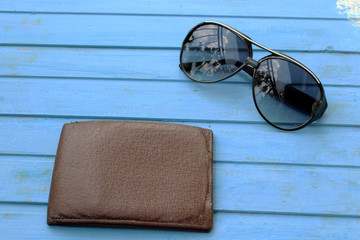 Man accessories - wallet and sunglasses