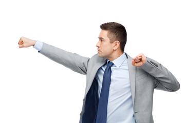 Wall Mural - businessman in suit fighting with someone