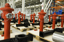 New Red Fire Hydrant On Plant`s Stock