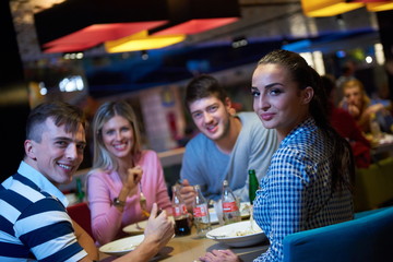 Wall Mural - friends have lanch break in shopping mall