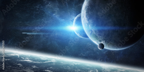 Cuadros en Lienzo Salida del sol sobre el planeta Tierra en el espacio