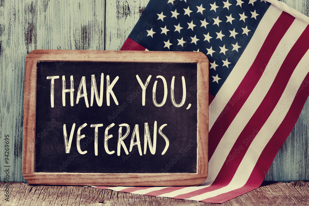 text thank you veterans in a chalkboard and the flag of the US - obrazy, fototapety, plakaty 