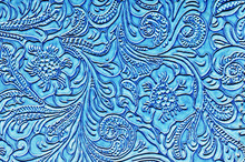 Blue Leather Embossed With A Floral Pattern
