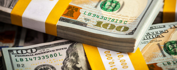 background of new us dollars banknotes bills