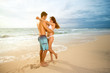 © luckybusiness - Couple on beach