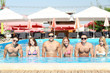 © Africa Studio - Young people having fun in the swimming pool