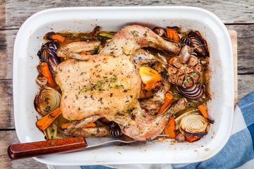 Wall Mural - whole baked chicken with vegetables and thyme