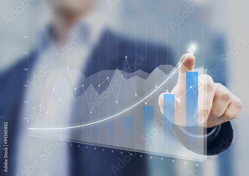 Fotomural Financial charts showing growing revenue on touch screen