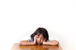 © phatpc - Bored children girl sitting at the table