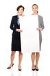 © Piotr Marcinski - Two businesswomen carrying a big white board.