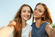 © LENSLOGIC - Two beautiful girls making selfie