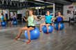 © Julián Maldonado - Young women exercising in a gym.