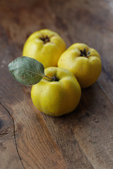 Wall Mural - Quince on wooden table
