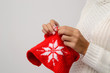 Woman knitting pattern of a snowflake